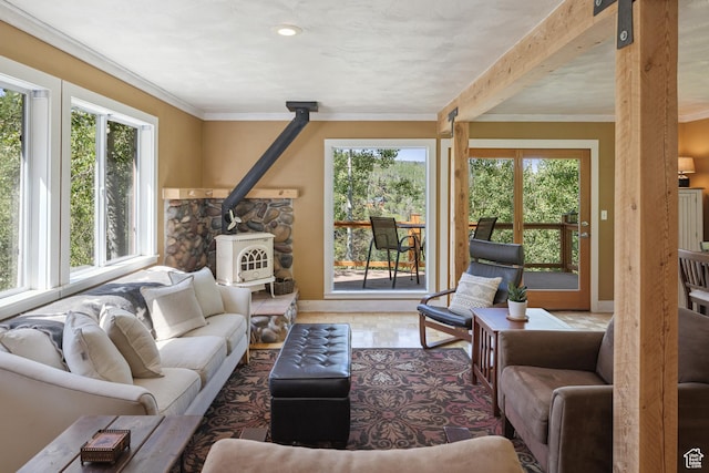 1519 Pine Needle Cir, Coalville, UT 84017 - living area featuring a wood stove and crown molding