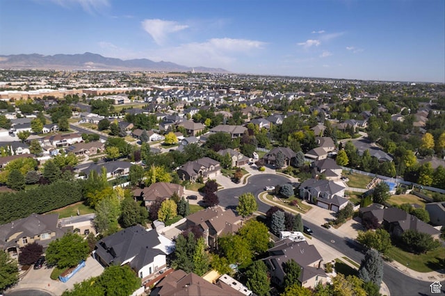 3371 W Waterbridge Cv Unit 417, South Jordan, UT 84095 - aerial overview of property's location with nearby suburban area and mountains