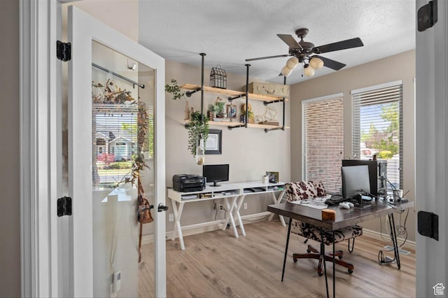3371 W Waterbridge Cv Unit 417, South Jordan, UT 84095 - office space featuring wood finished floors, a ceiling fan, and a textured ceiling
