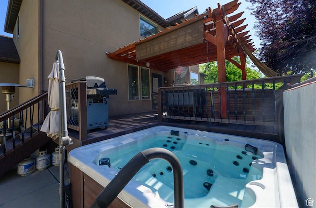 3371 W Waterbridge Cv Unit 417, South Jordan, UT 84095 - view of swimming pool featuring a hot tub, a wooden deck, area for grilling, and stairway