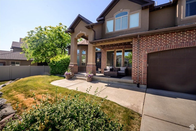 3371 W Waterbridge Cv Unit 417, South Jordan, UT 84095 - rear view of house with brick siding and stucco siding