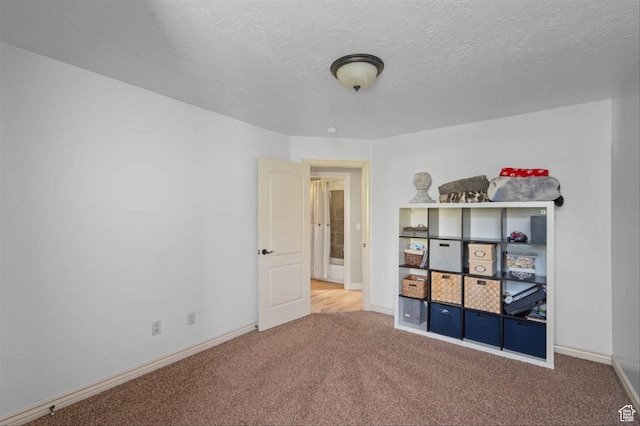 3371 W Waterbridge Cv Unit 417, South Jordan, UT 84095 - unfurnished bedroom with carpet flooring and a textured ceiling