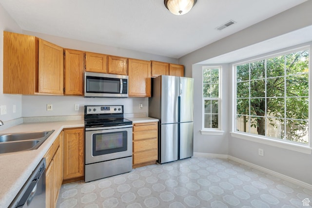 303 E 900 S Unit 42, Payson, UT 84651 - kitchen featuring stainless steel appliances, healthy amount of natural light, and light countertops