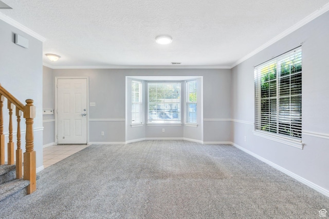 303 E 900 S Unit 42, Payson, UT 84651 - carpeted spare room featuring stairs, crown molding, and a textured ceiling