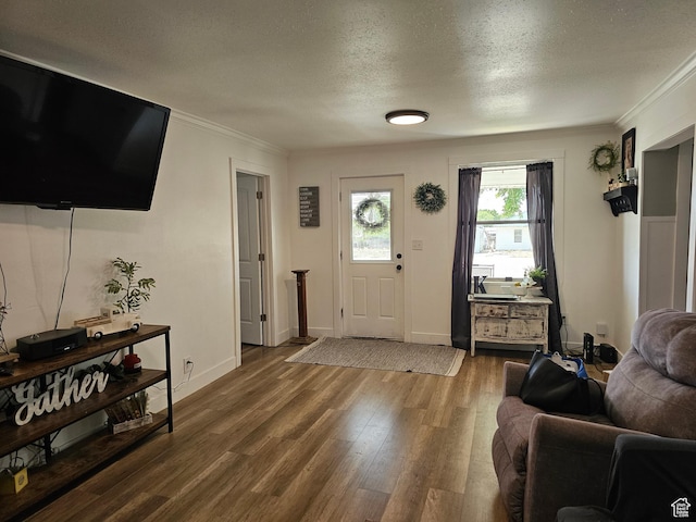 92 W 300 N, Huntington, UT 84528 - foyer entrance with ornamental molding, wood finished floors, and a textured ceiling