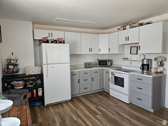 92 W 300 N, Huntington, UT 84528 - kitchen featuring white appliances, gray cabinets, light countertops, and a textured ceiling