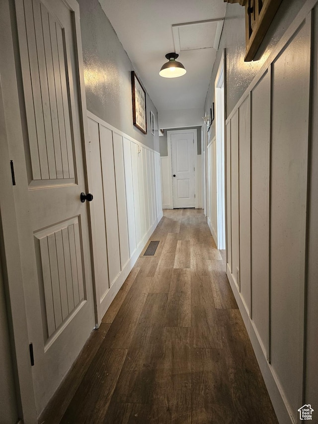 92 W 300 N, Huntington, UT 84528 - hallway featuring wood finished floors, a decorative wall, and a wainscoted wall