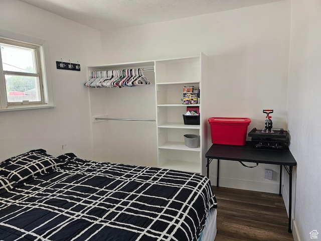 92 W 300 N, Huntington, UT 84528 - bedroom featuring wood finished floors and baseboards