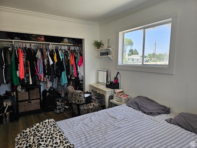 92 W 300 N, Huntington, UT 84528 - bedroom with a closet, wood finished floors, and ornamental molding