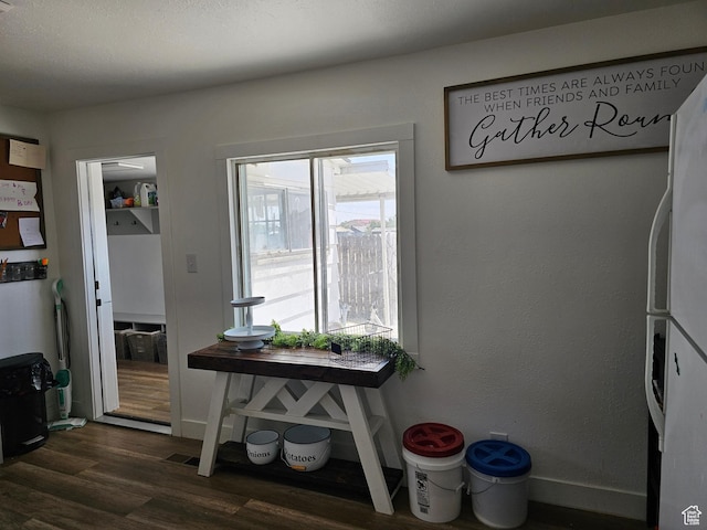 92 W 300 N, Huntington, UT 84528 - dining area with dark wood-style flooring and baseboards