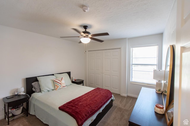 45 S 850 E Unit 8, Provo, UT 84606 - carpeted bedroom featuring a closet, a ceiling fan, and a textured ceiling