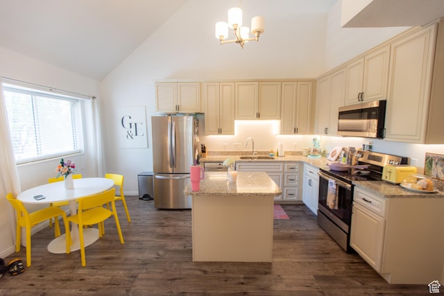 45 S 850 E Unit 8, Provo, UT 84606 - kitchen featuring stainless steel appliances, high vaulted ceiling, a chandelier, a center island, and light stone countertops