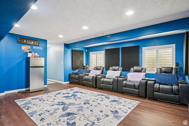13626 S Bluewing Way, Riverton, UT 84096 - home theater room featuring dark wood-type flooring and recessed lighting