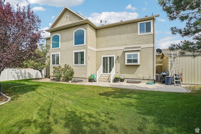 13626 S Bluewing Way, Riverton, UT 84096 - back of property featuring entry steps, a patio, and stucco siding