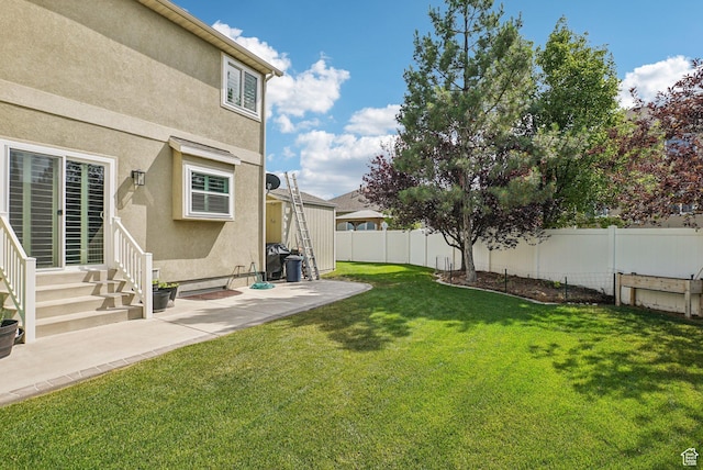 13626 S Bluewing Way, Riverton, UT 84096 - fenced backyard featuring entry steps and a patio area