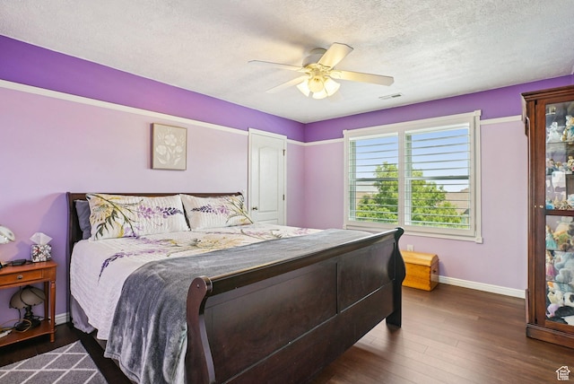 13626 S Bluewing Way, Riverton, UT 84096 - bedroom featuring a textured ceiling, a ceiling fan, and wood finished floors
