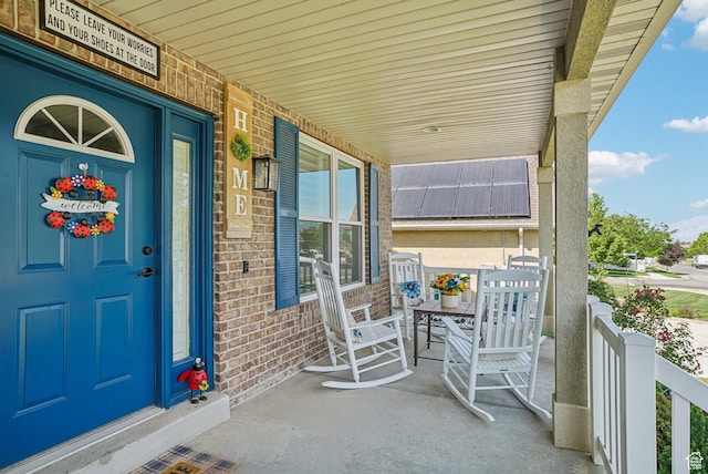 13626 S Bluewing Way, Riverton, UT 84096 - doorway to property with a porch and brick siding