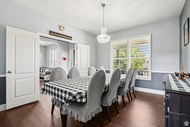 13626 S Bluewing Way, Riverton, UT 84096 - dining space featuring a chandelier and dark wood-style floors