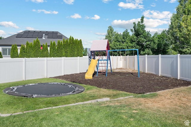 1965 N 3050 W, Provo, UT 84601 - view of playground with a trampoline and a fenced backyard