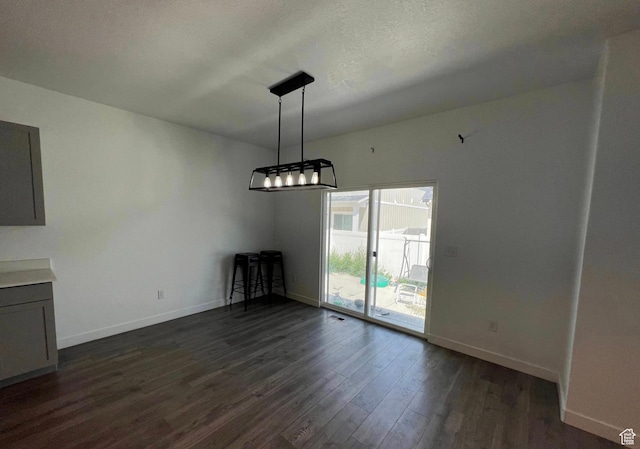 632 N Sugar Beet Dr Unit 224, Lehi, UT 84043 - unfurnished dining area with dark wood-type flooring and a chandelier