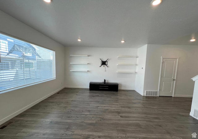 632 N Sugar Beet Dr Unit 224, Lehi, UT 84043 - unfurnished living room with dark wood-type flooring and recessed lighting