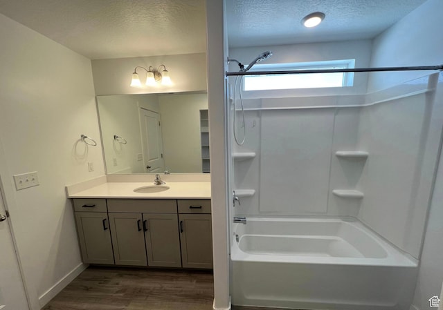 632 N Sugar Beet Dr Unit 224, Lehi, UT 84043 - full bathroom with a textured ceiling, wood finished floors,  shower combination, and vanity