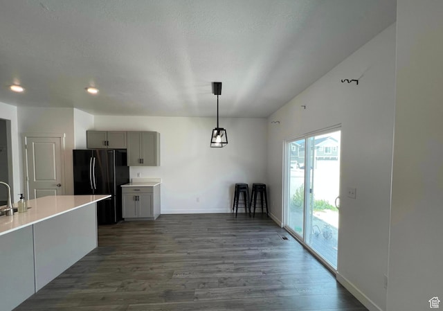 632 N Sugar Beet Dr Unit 224, Lehi, UT 84043 - kitchen with gray cabinetry, freestanding refrigerator, dark wood-style floors, light countertops, and recessed lighting