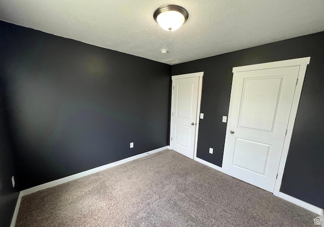 632 N Sugar Beet Dr Unit 224, Lehi, UT 84043 - unfurnished bedroom with carpet and a textured ceiling