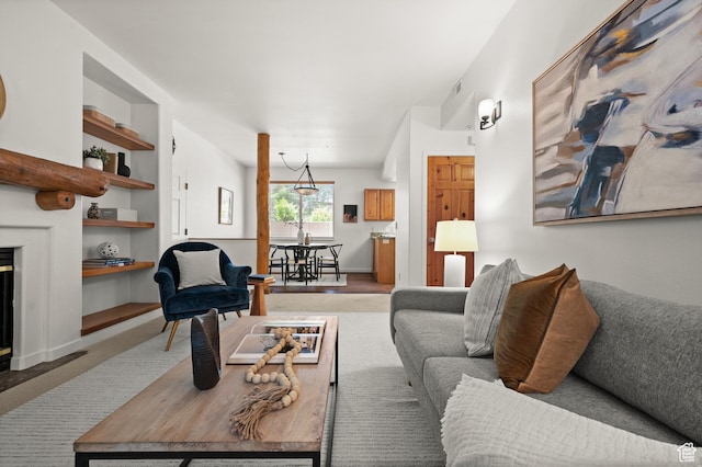 1600 W Pinebrook Blvd Unit F3, Park City, UT 84098 - living room featuring light colored carpet and built in features