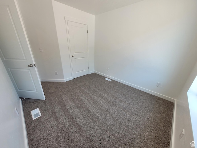 1596 S 3740 E Unit 1358, Spanish Fork, UT 84660 - unfurnished room with dark carpet and baseboards