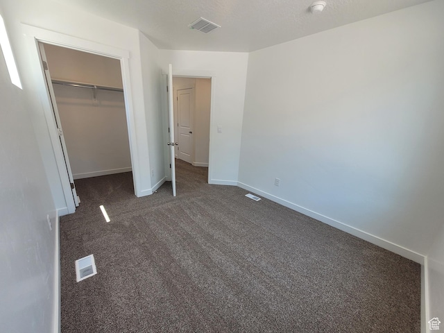 1596 S 3740 E Unit 1358, Spanish Fork, UT 84660 - unfurnished bedroom featuring dark colored carpet and a closet