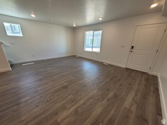1596 S 3740 E Unit 1358, Spanish Fork, UT 84660 - spare room with dark wood-style floors, stairs, a textured ceiling, and recessed lighting