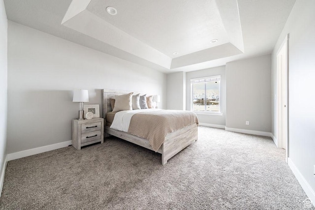 2259 S 1180 W Unit 12, Nibley, UT 84321 - carpeted bedroom with a raised ceiling and baseboards