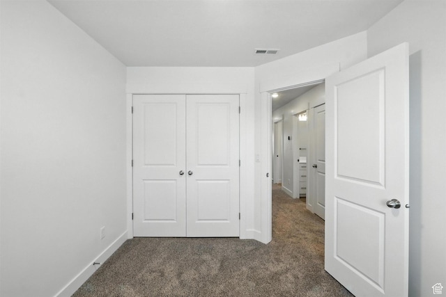 1221 W 1870 S, Logan, UT 84321 - unfurnished bedroom with dark colored carpet and a closet