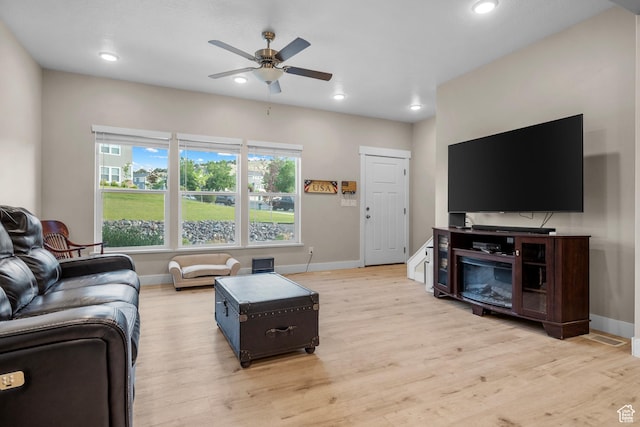 2722 E Iron Bark Aly, Eagle Mountain, UT 84005 - living area with light wood-style floors, ceiling fan, and recessed lighting