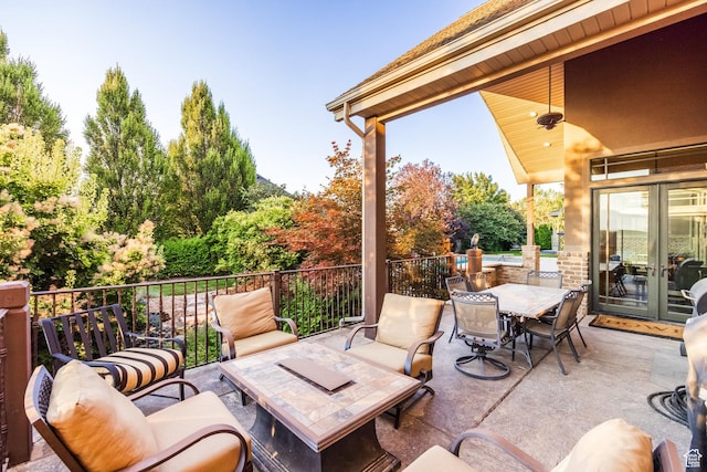 694 W Cephus Rd, Draper, UT 84020 - view of patio with french doors, an outdoor living space, and outdoor dining space