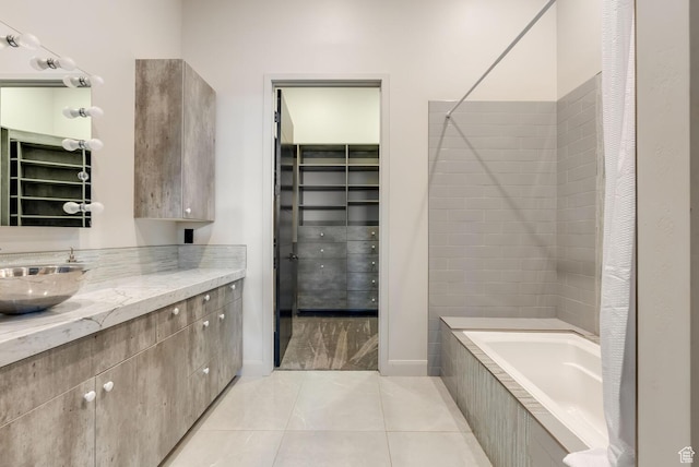 2836 S 2300th Cir E, St George, UT 84790 - full bathroom with tile patterned floors, vanity, a walk in closet, and tiled shower / bath