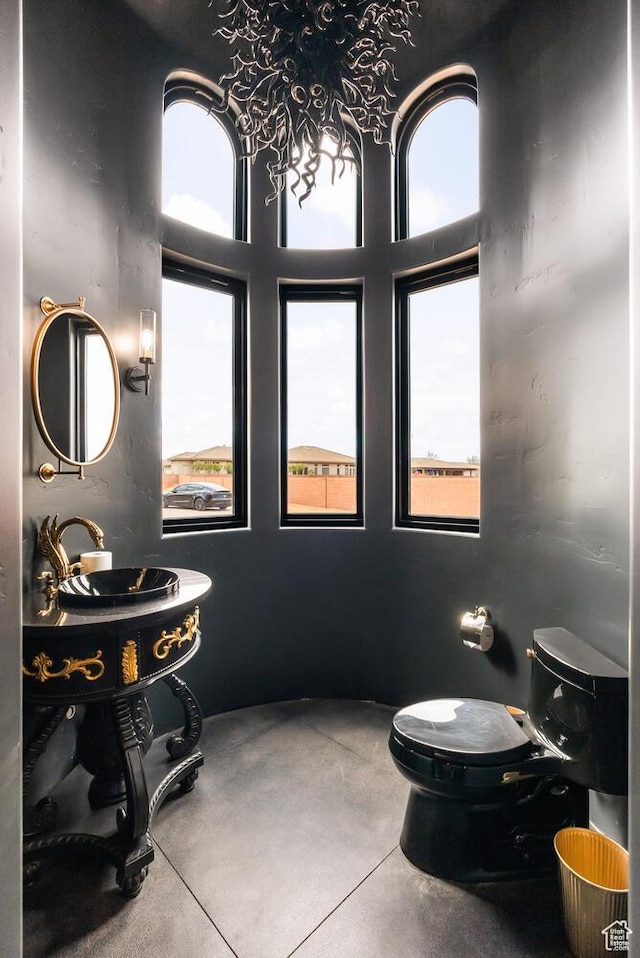 2836 S 2300th Cir E, St George, UT 84790 - half bathroom with healthy amount of natural light and finished concrete flooring