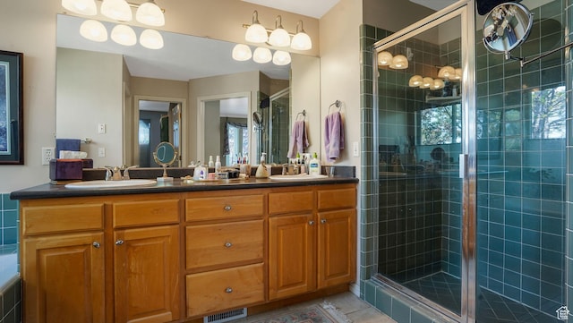 2262 E Emerald Hills Ct, Cottonwood Heights, UT 84121 - bathroom with double vanity, a stall shower, and tile patterned flooring