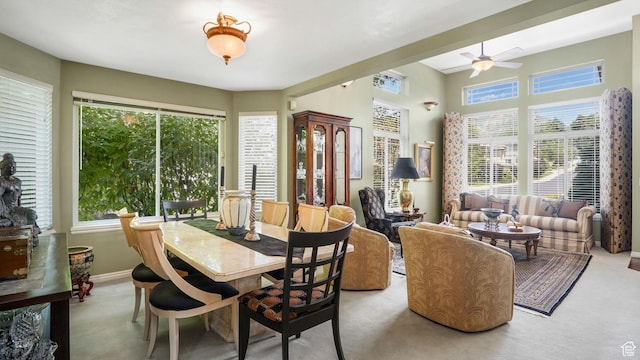 2262 E Emerald Hills Ct, Cottonwood Heights, UT 84121 - dining room featuring healthy amount of natural light, light colored carpet, and ceiling fan