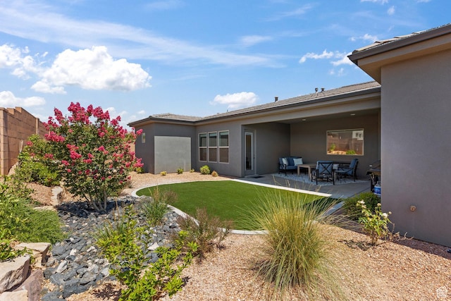 499 W Palo Verde Way Unit 61, Ivins, UT 84738 - view of yard featuring a patio and outdoor lounge area