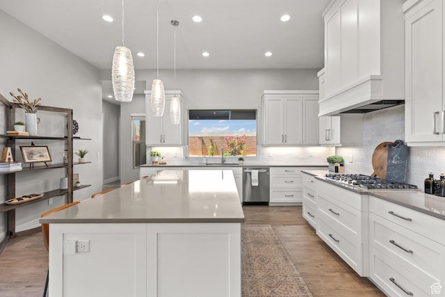 499 W Palo Verde Way Unit 61, Ivins, UT 84738 - kitchen with appliances with stainless steel finishes, decorative backsplash, white cabinets, and recessed lighting