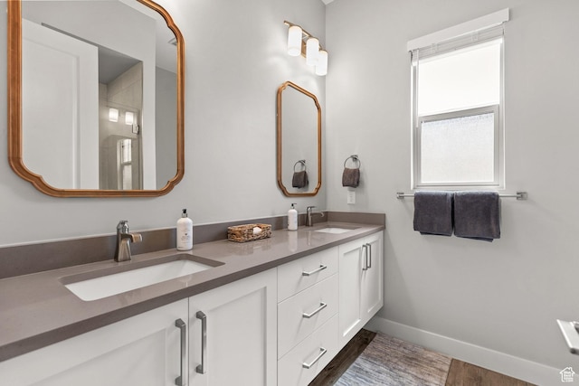 499 W Palo Verde Way Unit 61, Ivins, UT 84738 - bathroom featuring double vanity and wood finished floors