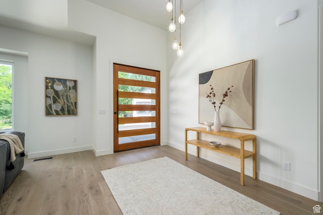 1958 E Longview Dr, Holladay, UT 84124 - foyer featuring wood finished floors and baseboards