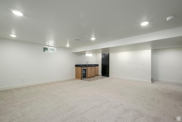 1958 E Longview Dr, Holladay, UT 84124 - finished basement with beverage cooler, bar with sink, light carpet, and recessed lighting