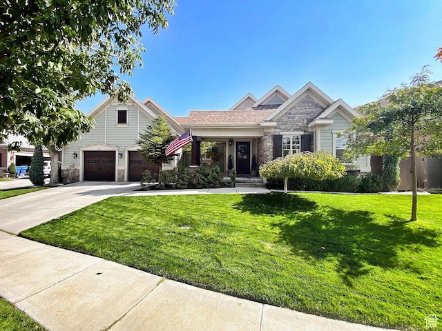 4854 N Shady Bend Ln, Lehi, UT 84043 - craftsman house featuring stone siding, a front yard, and concrete driveway
