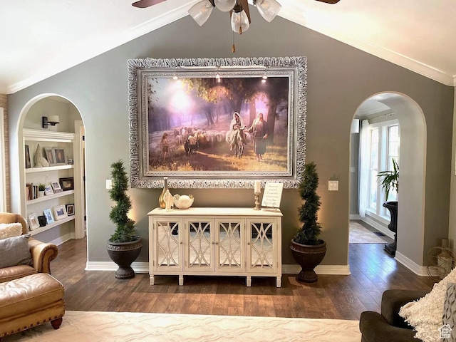 4854 N Shady Bend Ln, Lehi, UT 84043 - living room featuring a ceiling fan, arched walkways, vaulted ceiling, wood finished floors, and crown molding