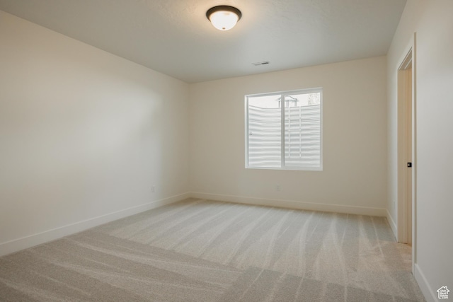 1026 W Chokecherry Dr Unit 135, Mapleton, UT 84664 - spare room with baseboards and light carpet