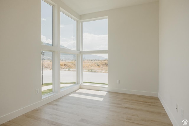 1026 W Chokecherry Dr Unit 135, Mapleton, UT 84664 - empty room with light wood-style flooring