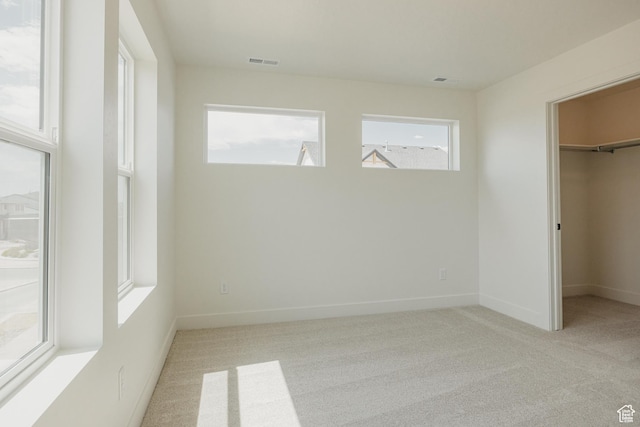 1026 W Chokecherry Dr Unit 135, Mapleton, UT 84664 - unfurnished bedroom with carpet flooring and a walk in closet